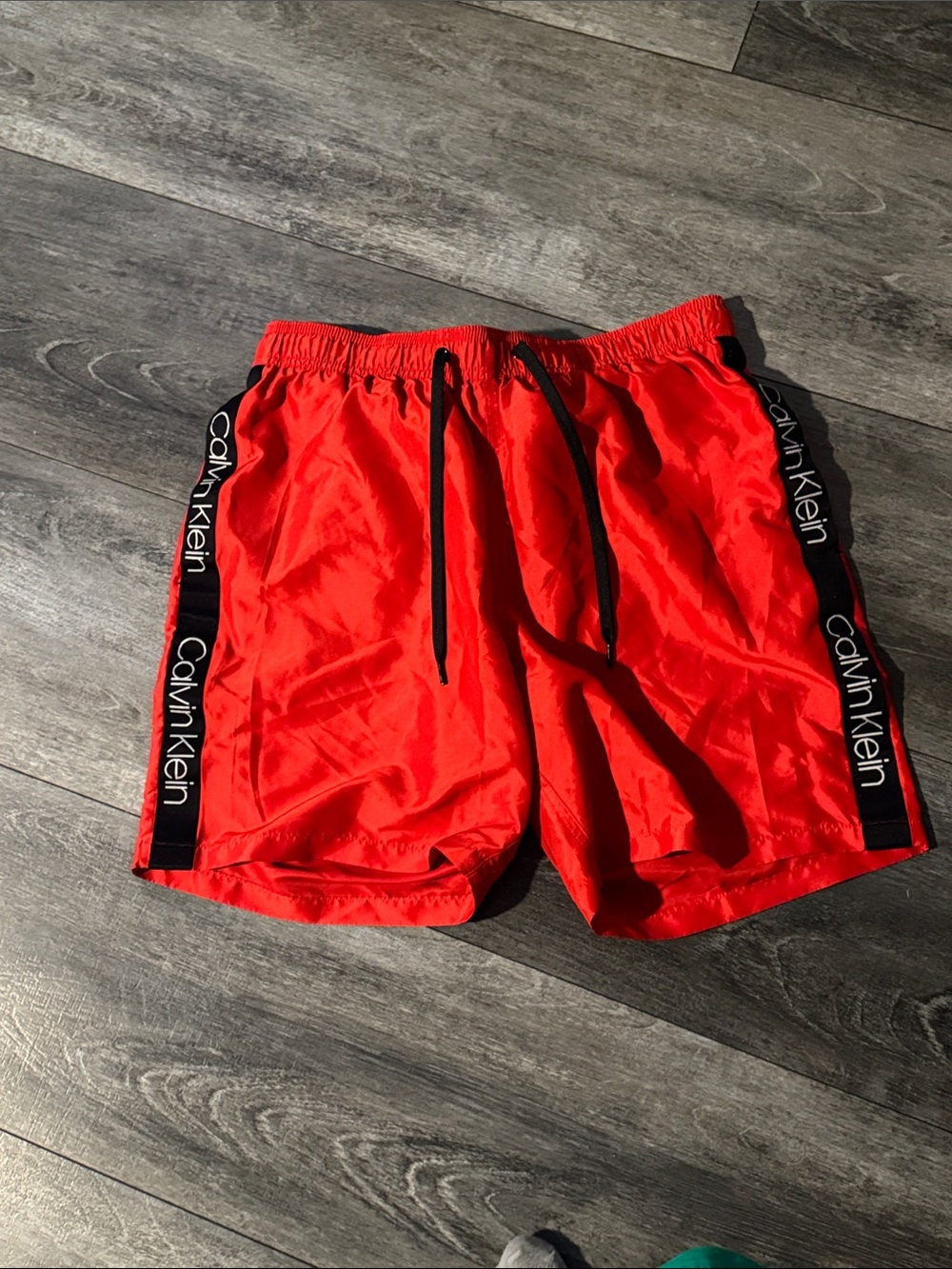 Calvin Klein Red Men's Athletic Swim Shorts with Black Logo Tape